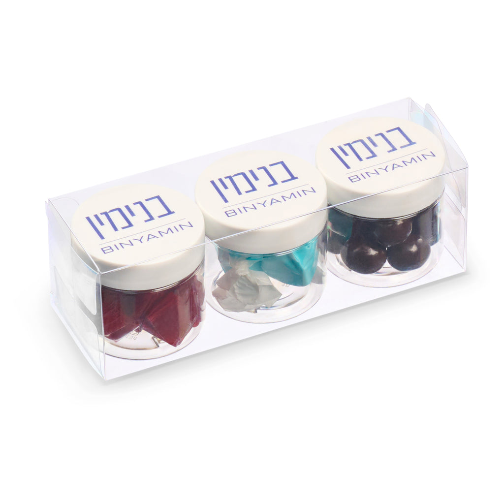 Three small jars with lids labeled 'Binyamin' containing different colored items in a clear packaging box.
